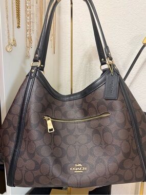 Coach Brown Signature Canvas Hobo with Black Trim and Gold Hardware